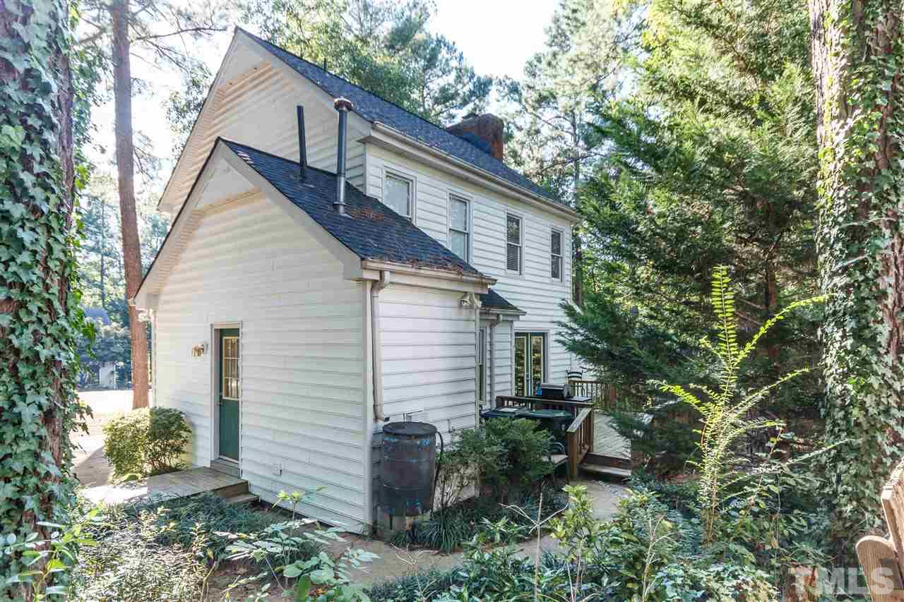 4500 Rutland Court Raleigh, NC 27613 - Photo 23 of 23 a backyard of a house with lots of green space