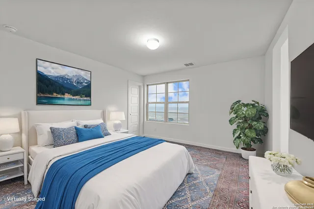 a kitchen with kitchen island sink stove and cabinets