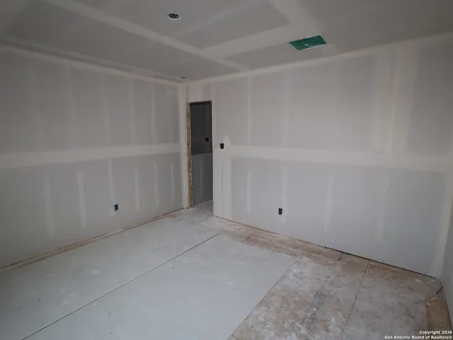 a front view of a house with garage