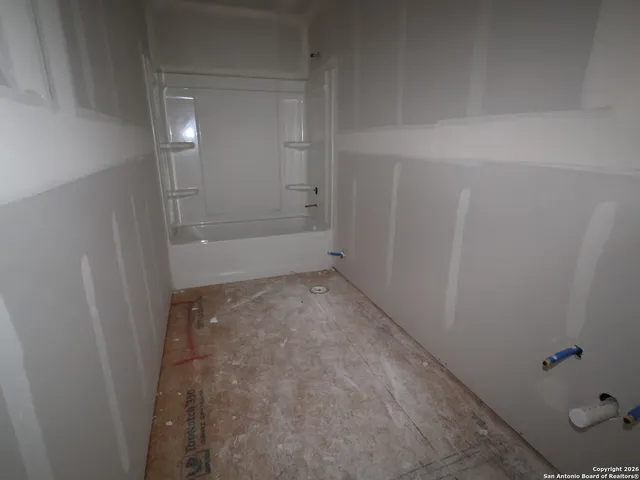 a front view of a house with garage