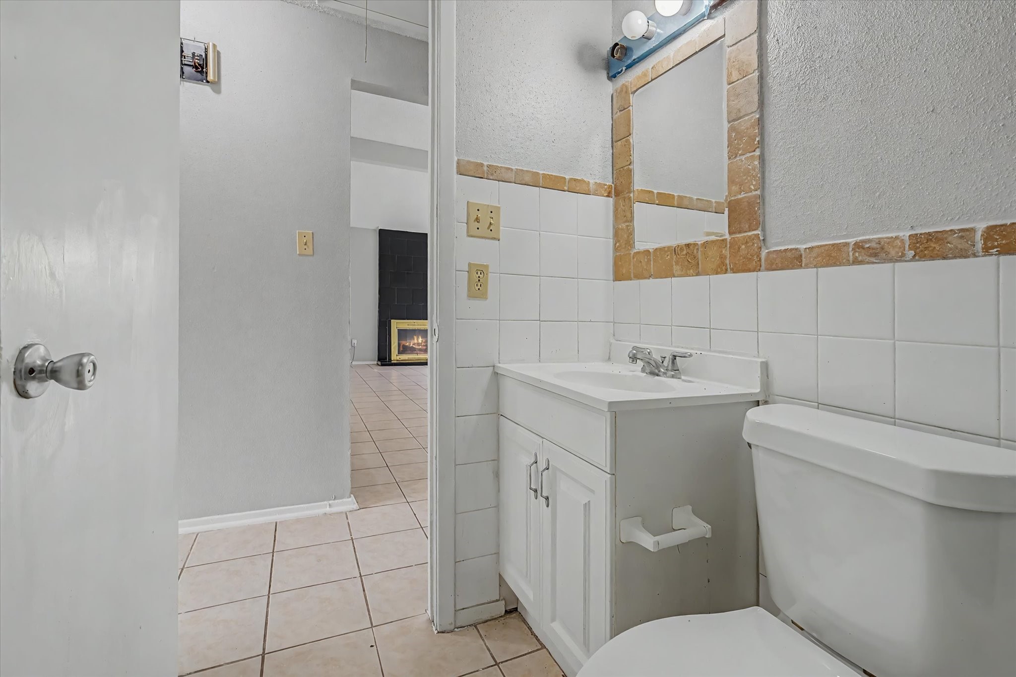 7330 South Dairy Ashford Road Houston, TX 77072 - Photo 26 of 33 a bathroom with a sink toilet and mirror