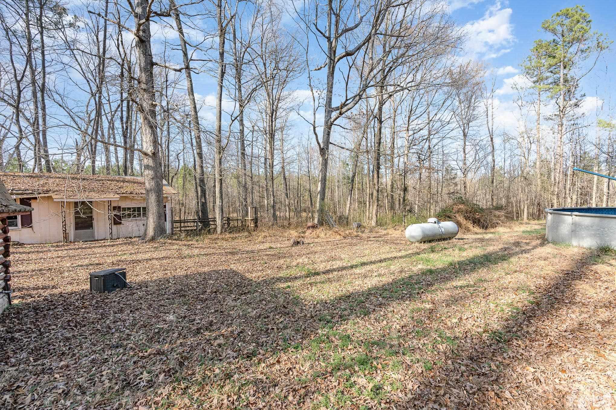 1613 Sanders Road Stem, NC 27581 - Photo 19 of 19 a view of a house with a yard