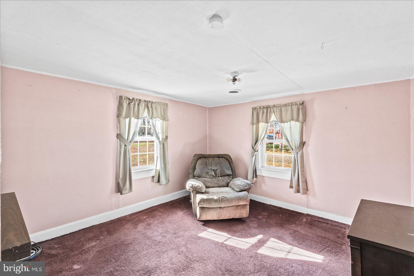 140 Barrett Heights Road Stafford, VA 22554 - Photo 11 of 39 a living room with furniture and a window