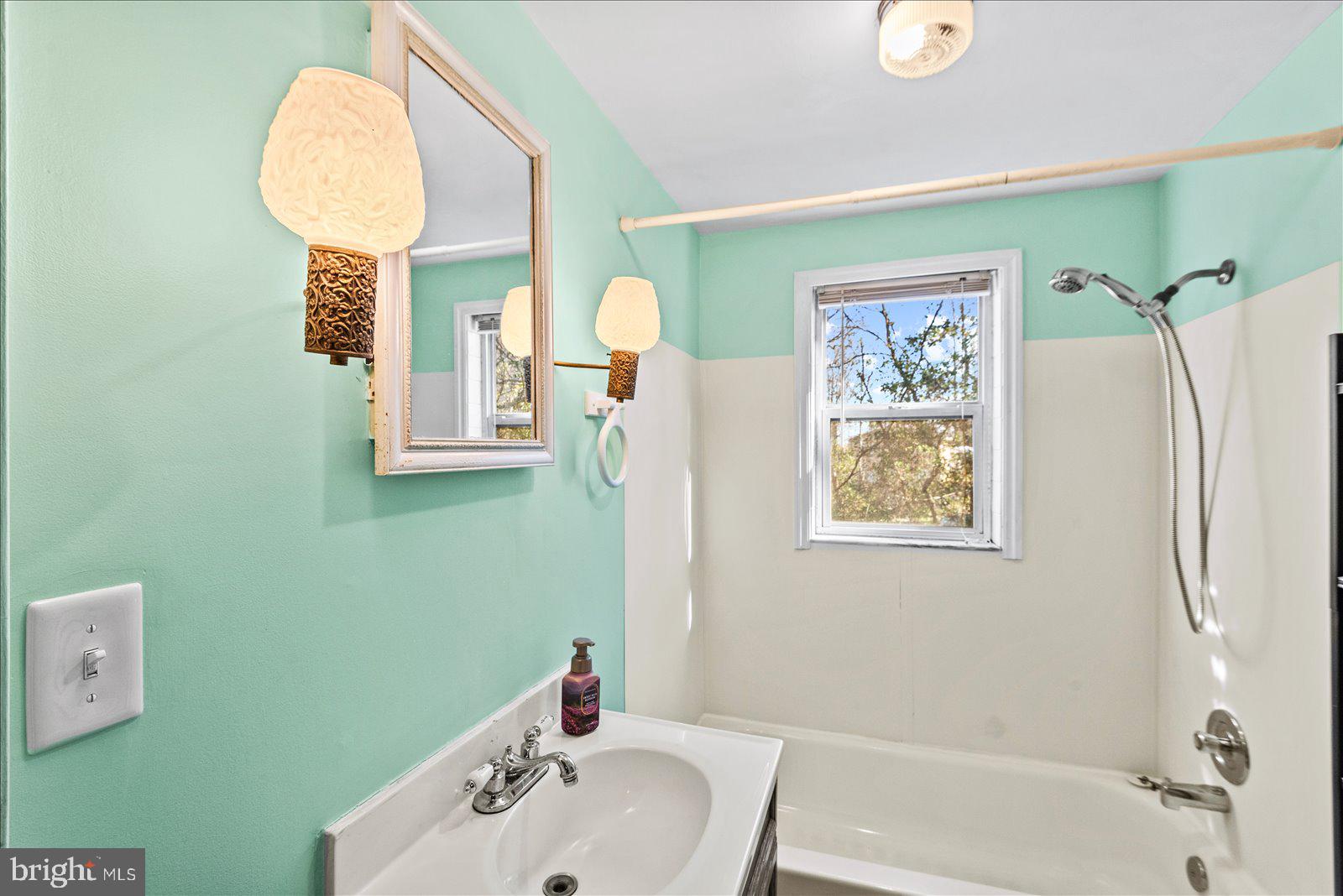 140 Barrett Heights Road Stafford, VA 22554 - Photo 13 of 39 a bathroom with a sink mirror and toilet