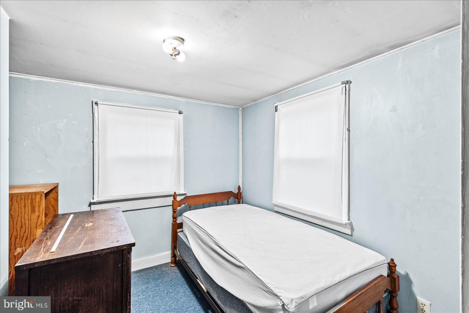 140 Barrett Heights Road Stafford, VA 22554 - Photo 16 of 39 a room with a bed and a dresser