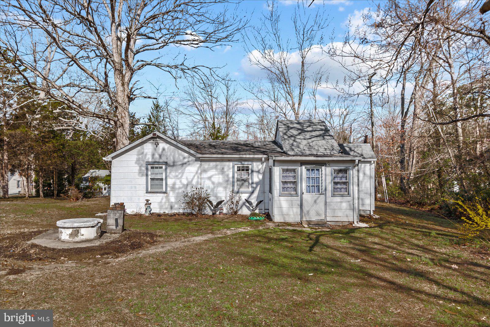 140 Barrett Heights Road Stafford, VA 22554 - Photo 21 of 39 a front view of house with yard and trees around