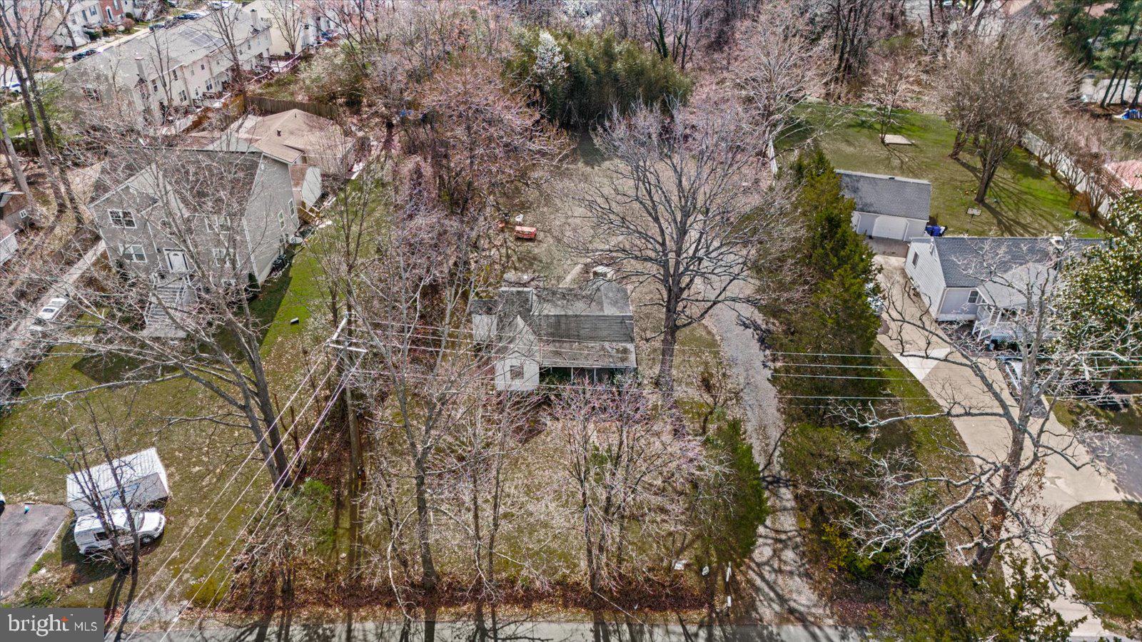 140 Barrett Heights Road Stafford, VA 22554 - Photo 31 of 39 a aerial view of a house with a yard and large trees