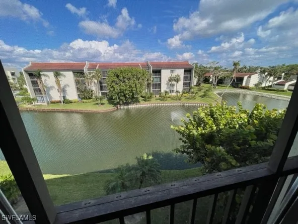 a view of a lake from a balcony