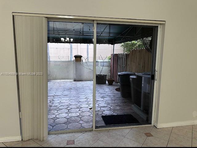 8260 Northwest 10th Street, Unit 7 Miami, FL 33126 - Photo 8 of 23 a view of a porch