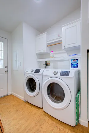 a utility room with dryer and washer