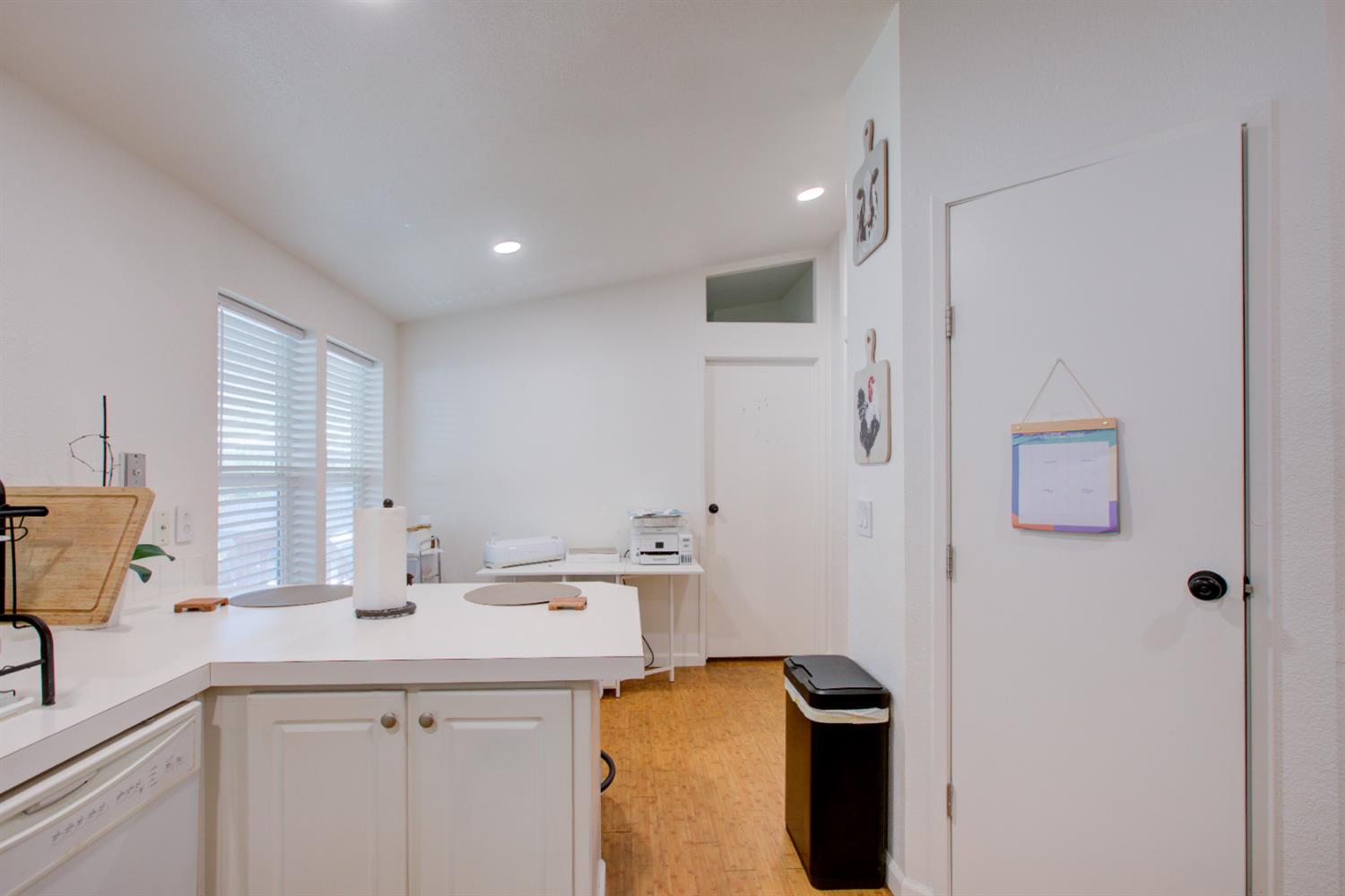 6450 North Winton Way, Unit 76 Winton, CA 95301 - Photo 17 of 36 a kitchen with a sink and a refrigerator