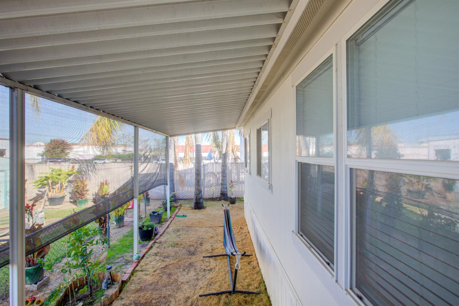 6450 North Winton Way, Unit 76 Winton, CA 95301 - Photo 24 of 36 a view of a porch