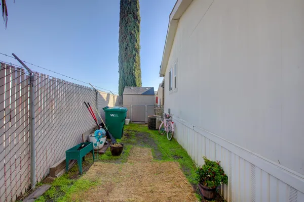 a view of a backyard with plants