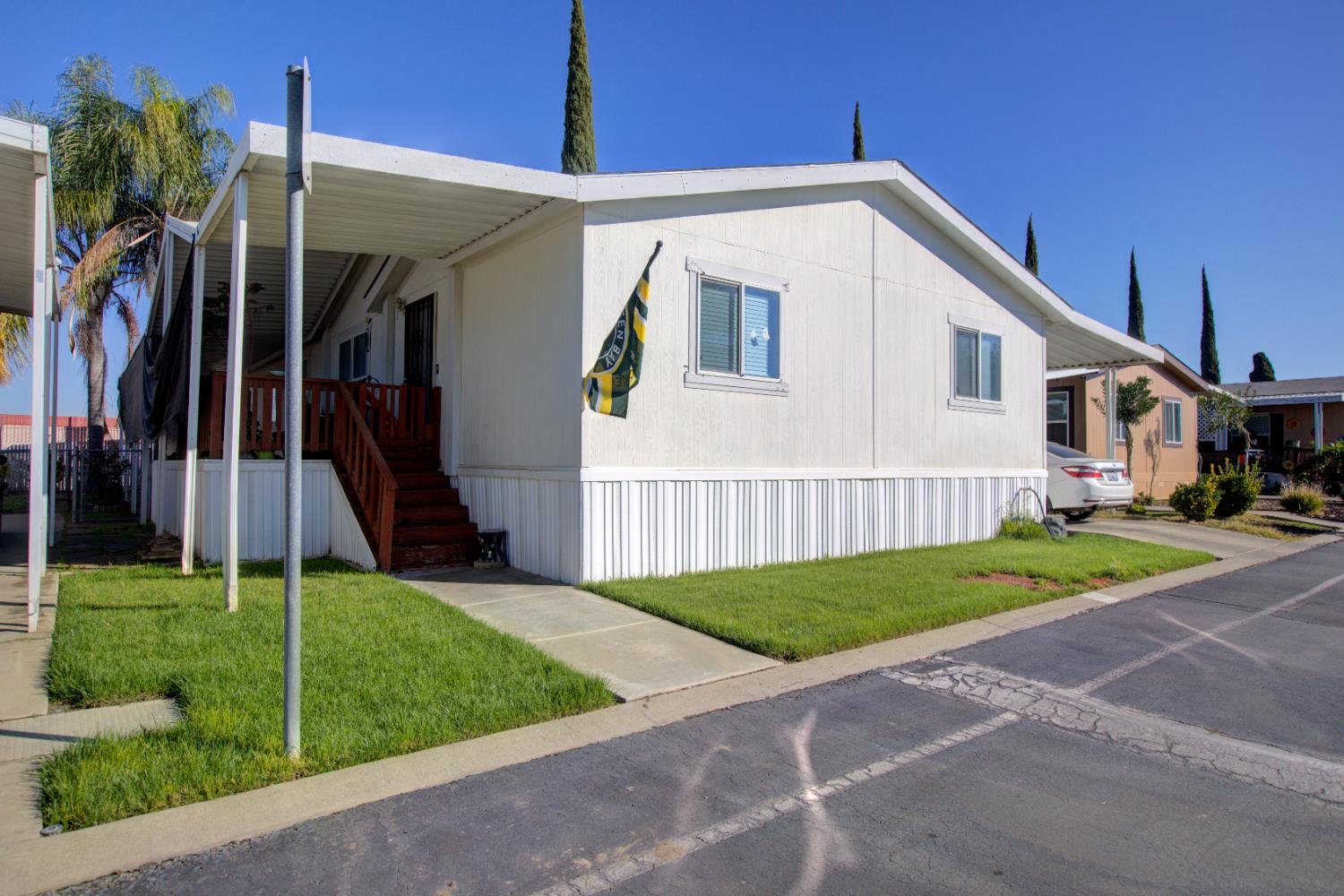 6450 North Winton Way, Unit 76 Winton, CA 95301 - Photo 28 of 36 a view of a house with backyard and porch