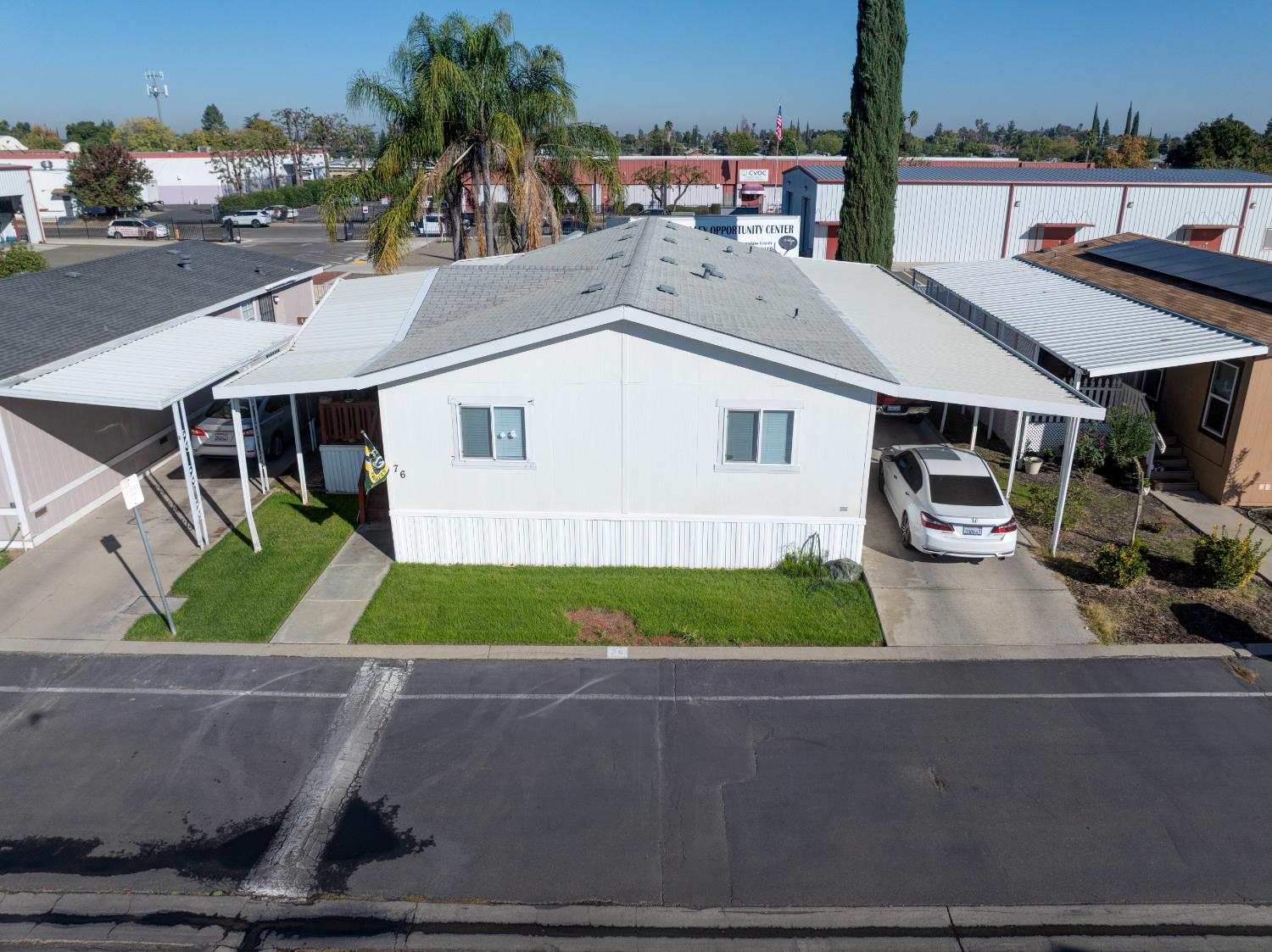 6450 North Winton Way, Unit 76 Winton, CA 95301 - Photo 29 of 36 an aerial view of a house with garden space and street view