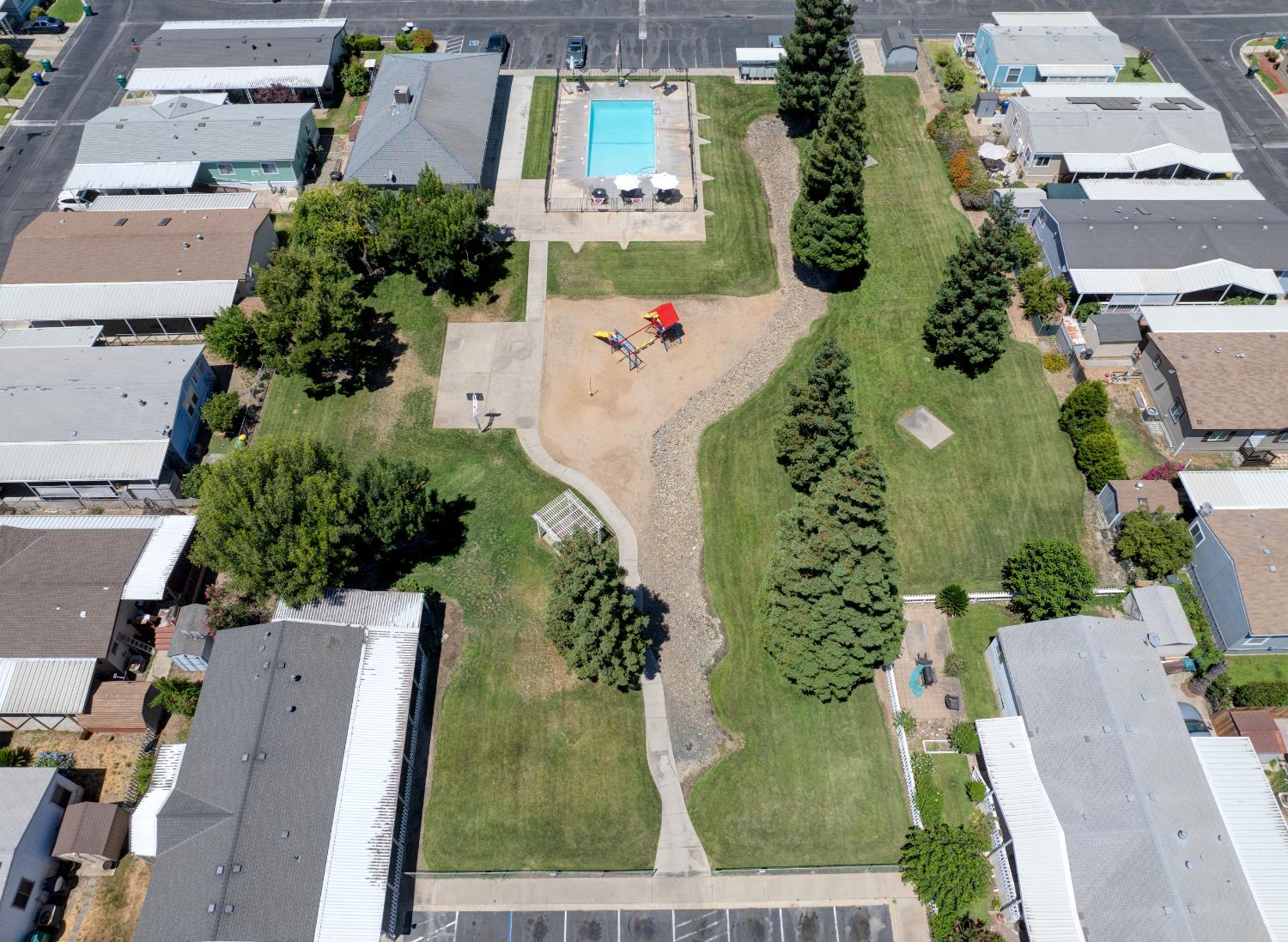 6450 North Winton Way, Unit 76 Winton, CA 95301 - Photo 34 of 36 an aerial view of residential houses with outdoor space