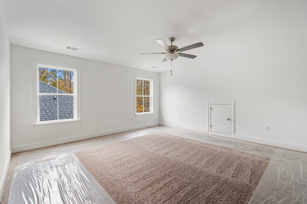 49 Altapass Way Fortson, GA 31808 - Photo 18 of 19 a view of an empty room with a window