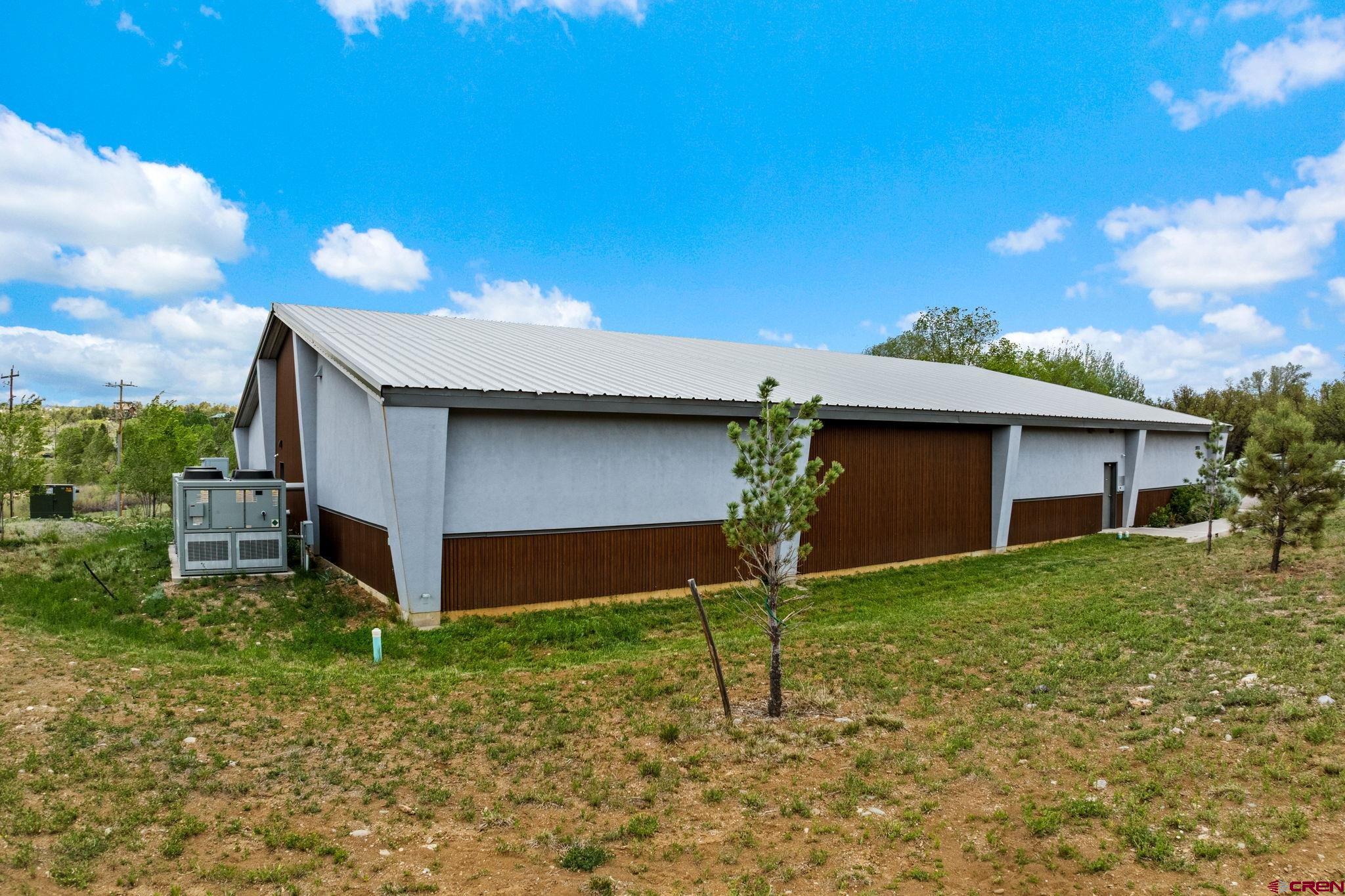 28753 Highway 160 Durango, CO 81301 - Photo 3 of 12 a house with a tree in front of it