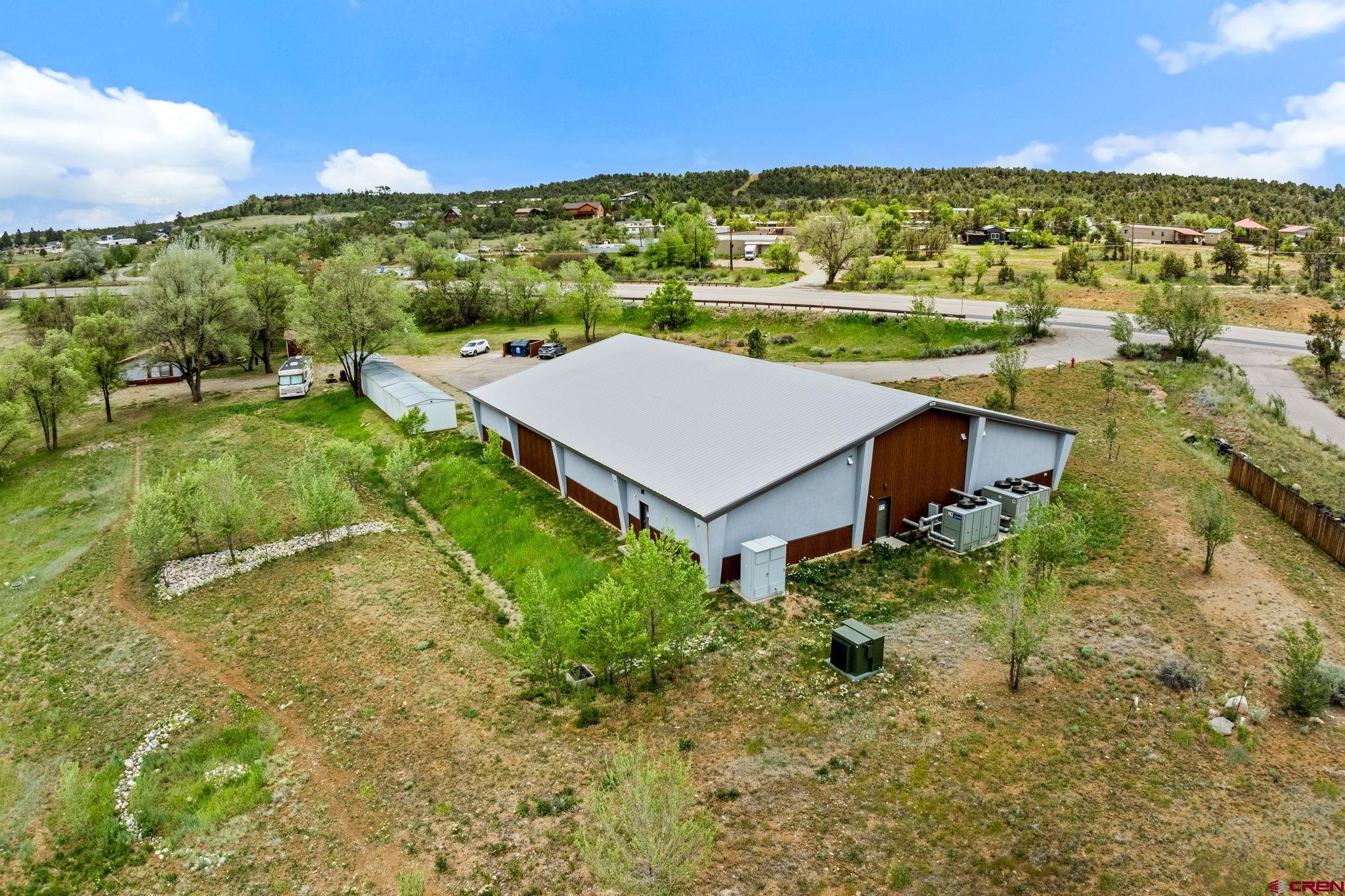 28753 Highway 160 Durango, CO 81301 - Photo 5 of 12 a view of a garden with a building in the background
