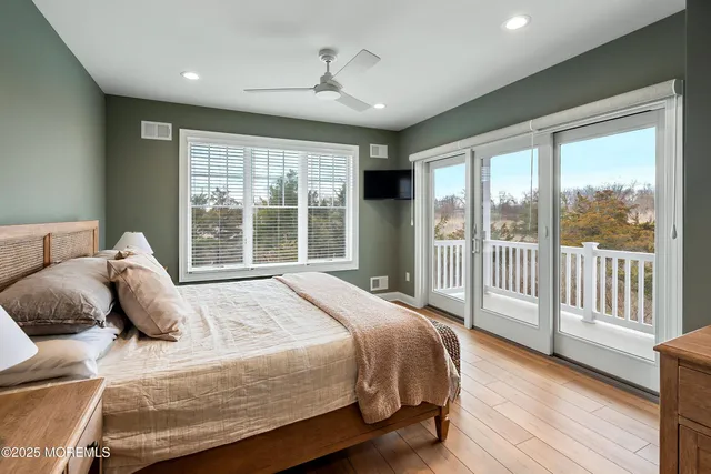 a view of a balcony with yard
