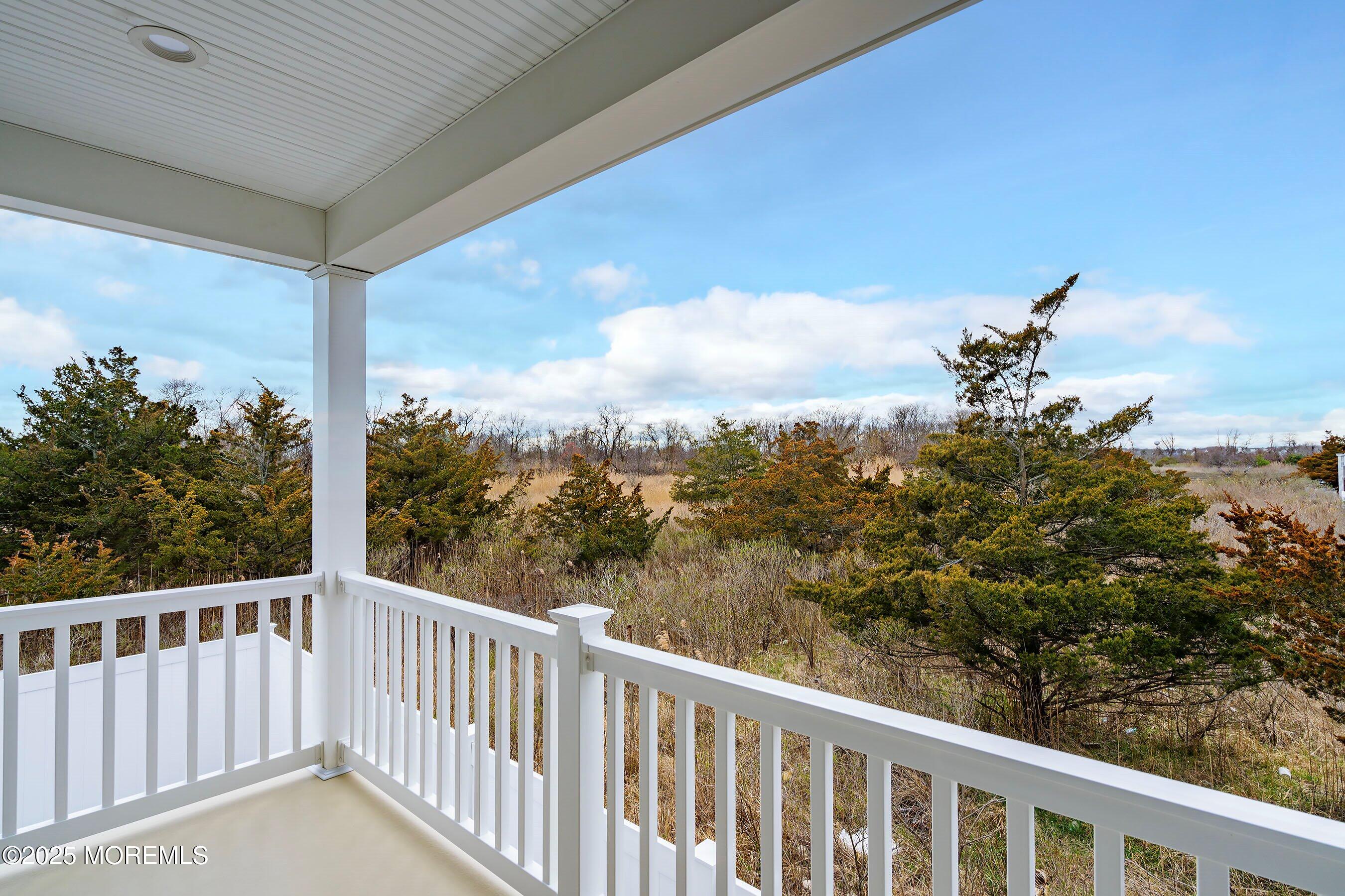 543 Brielle Road Manasquan, NJ 08736 - Photo 14 of 36 a view of a balcony with yard
