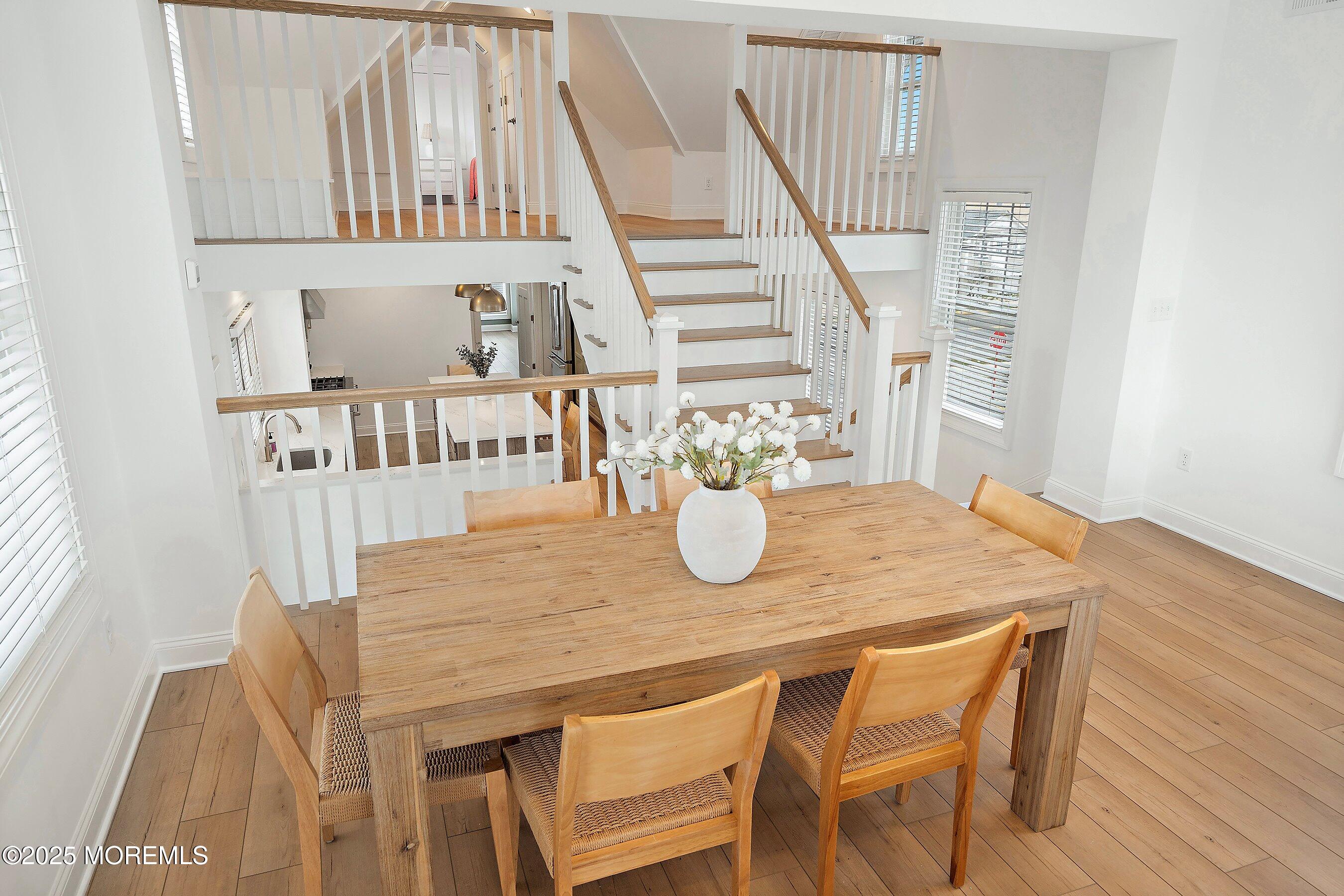 543 Brielle Road Manasquan, NJ 08736 - Photo 19 of 36 a view of a dining room with furniture and wooden floor