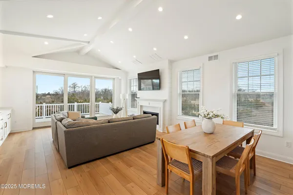 a balcony with wooden floor