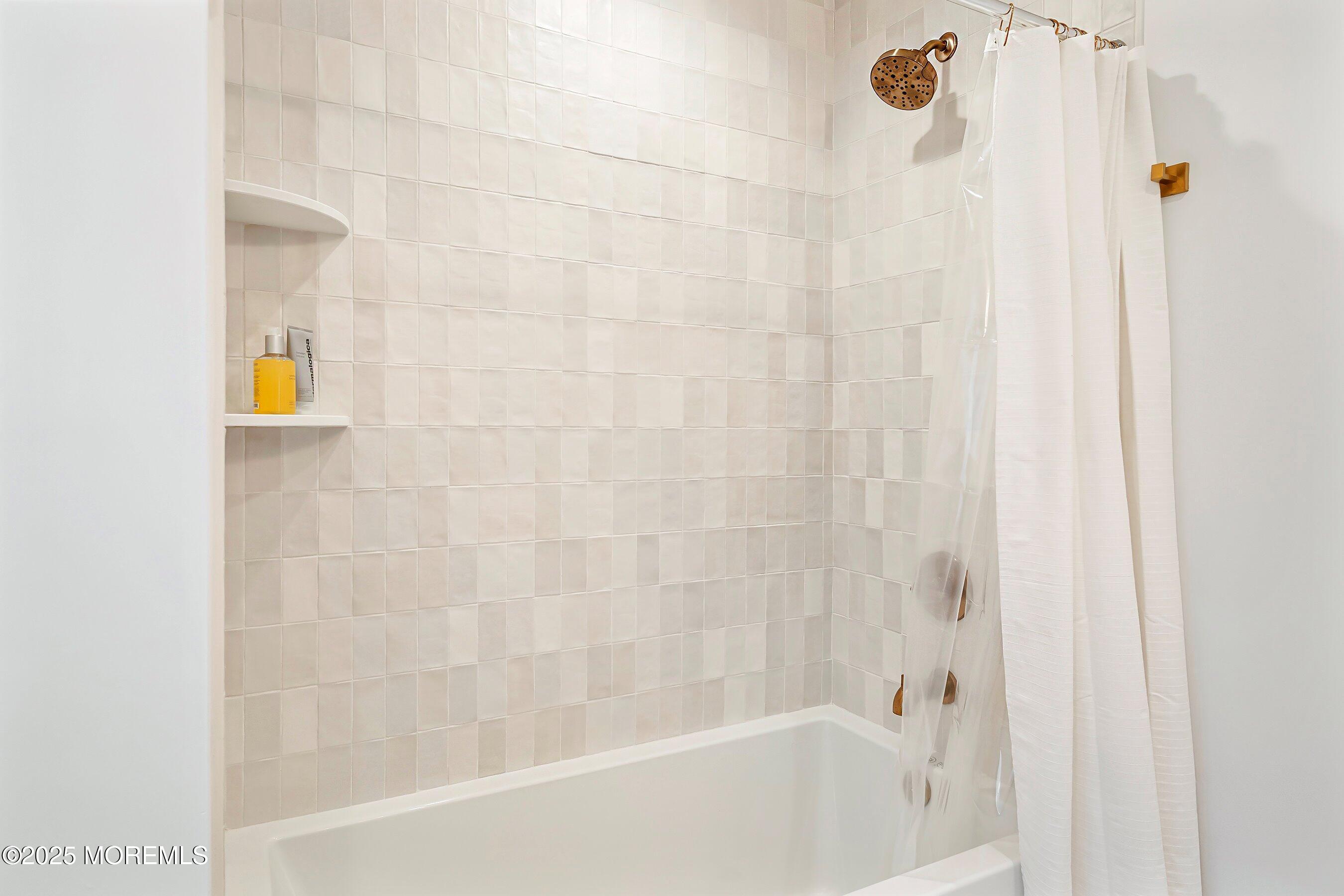 543 Brielle Road Manasquan, NJ 08736 - Photo 30 of 36 a bathroom with a bathtub