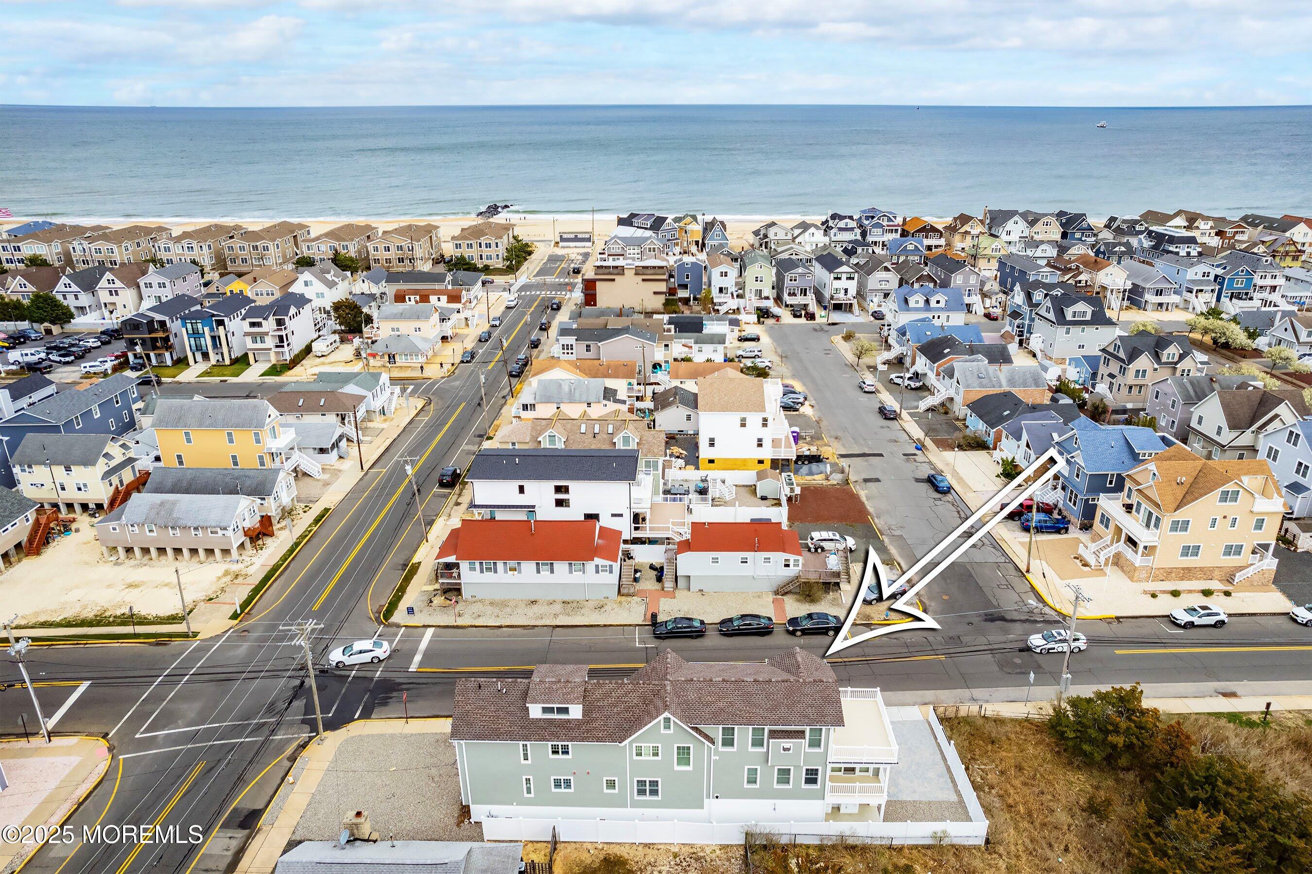 543 Brielle Road Manasquan, NJ 08736 - Photo 3 of 36 an aerial view of residential houses with outdoor space