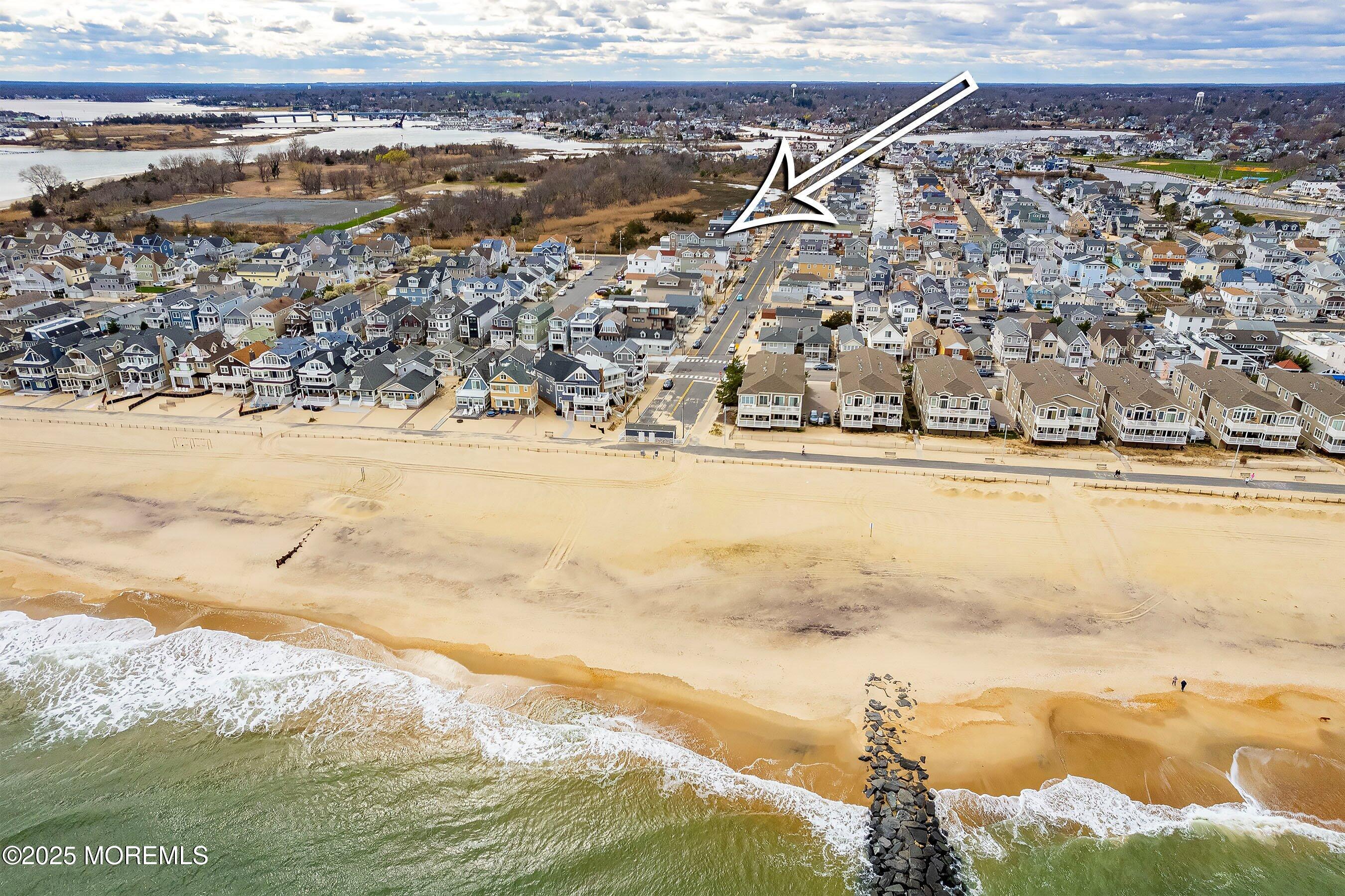 543 Brielle Road Manasquan, NJ 08736 - Photo 6 of 36 a view of an ocean and beach