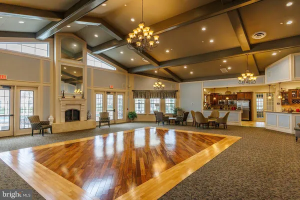 a view of city with tall buildings and a big yard