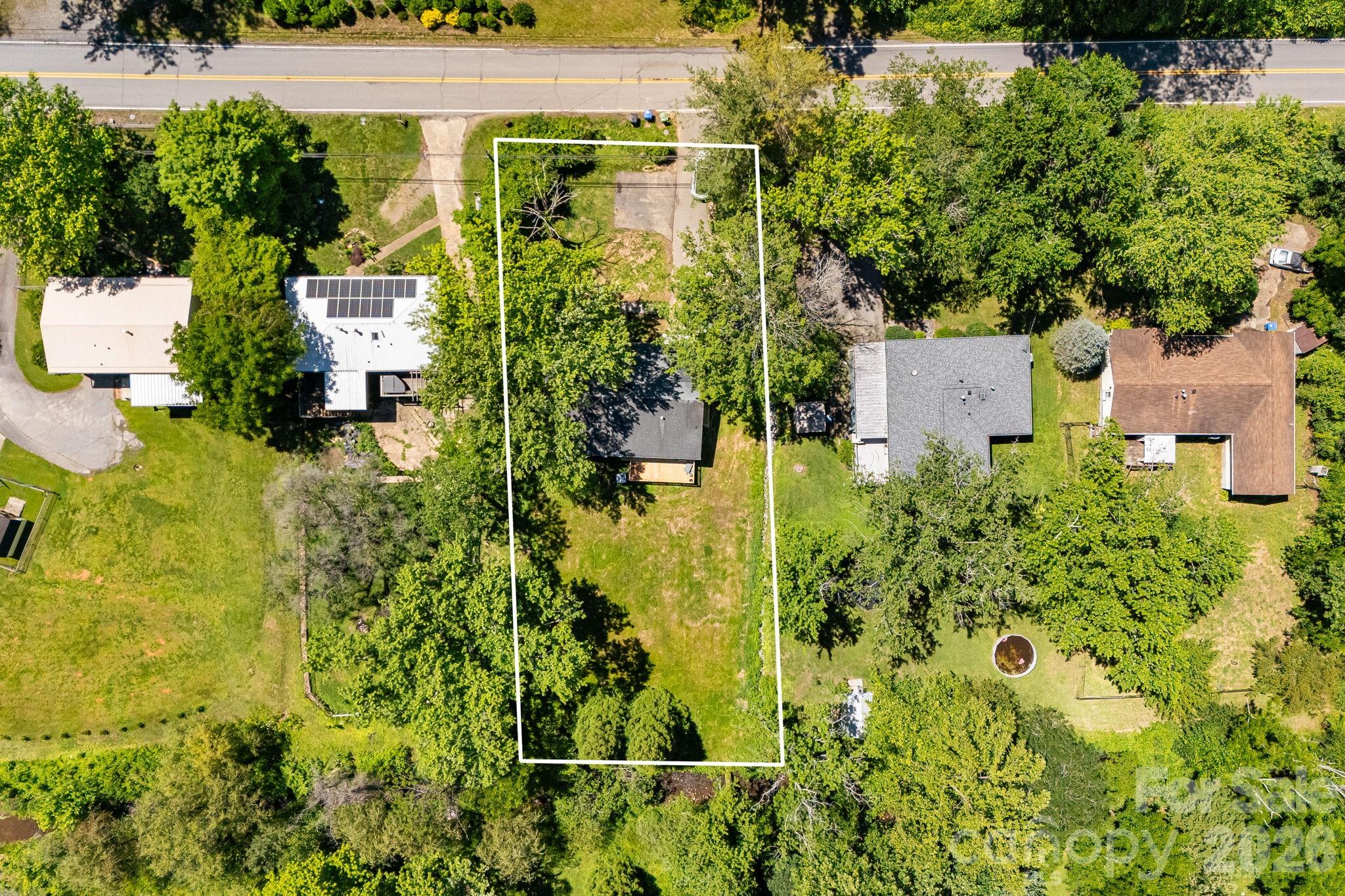 468 Beaverdam Road Asheville, NC 28804 - Photo 8 of 19 an aerial view of residential house with swimming pool