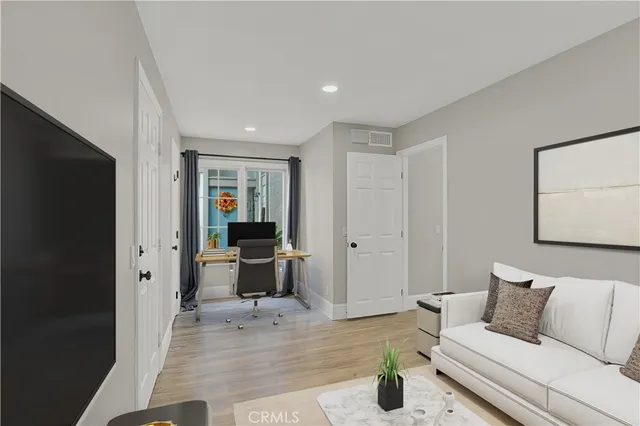 a living room with furniture and a couch