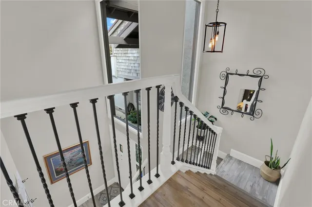 a view of entryway with stairs and wooden floor