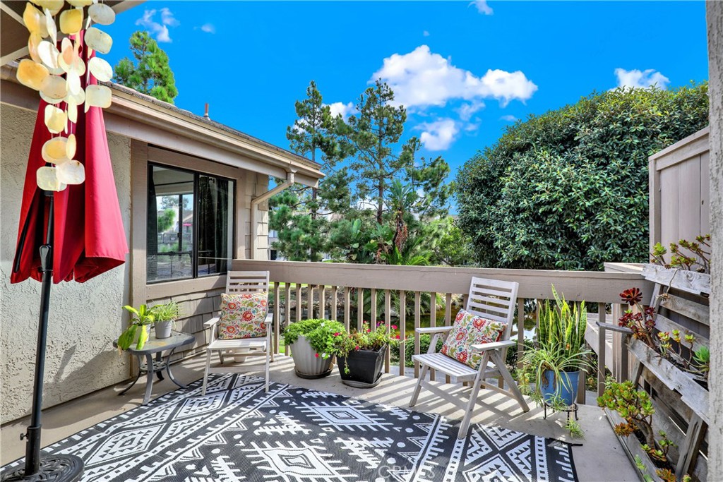 27112 Mill Pond Road, Unit 2 Dana Point, CA 92624 - Photo 28 of 51 Deck off from Primary Suite w/views of grounds and pond