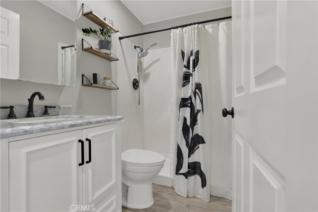 27112 Mill Pond Road, Unit 2 Dana Point, CA 92624 - Photo 30 of 51 Hall bathroom with large walk in shower