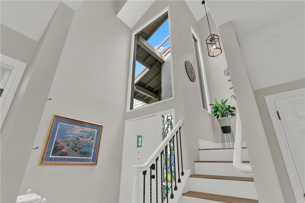 27112 Mill Pond Road, Unit 2 Dana Point, CA 92624 - Photo 4 of 50 a view of entryway with wooden floor