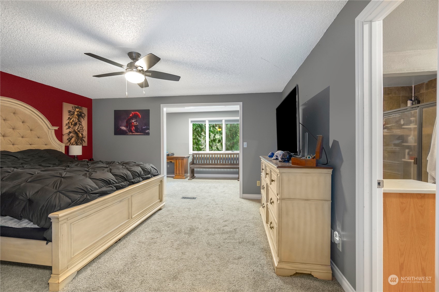2712 Seminary Hill Road Centralia, WA 98531 - Photo 17 of 40 a bedroom with a large bed and a window