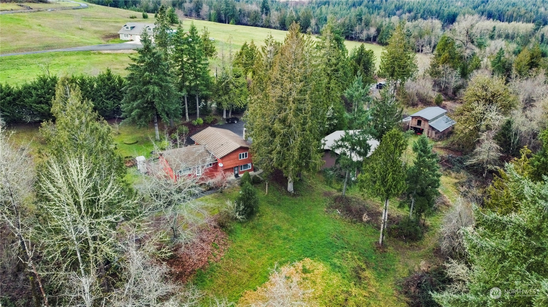 2712 Seminary Hill Road Centralia, WA 98531 - Photo 3 of 40 a backyard of a house with a yard and outdoor seating