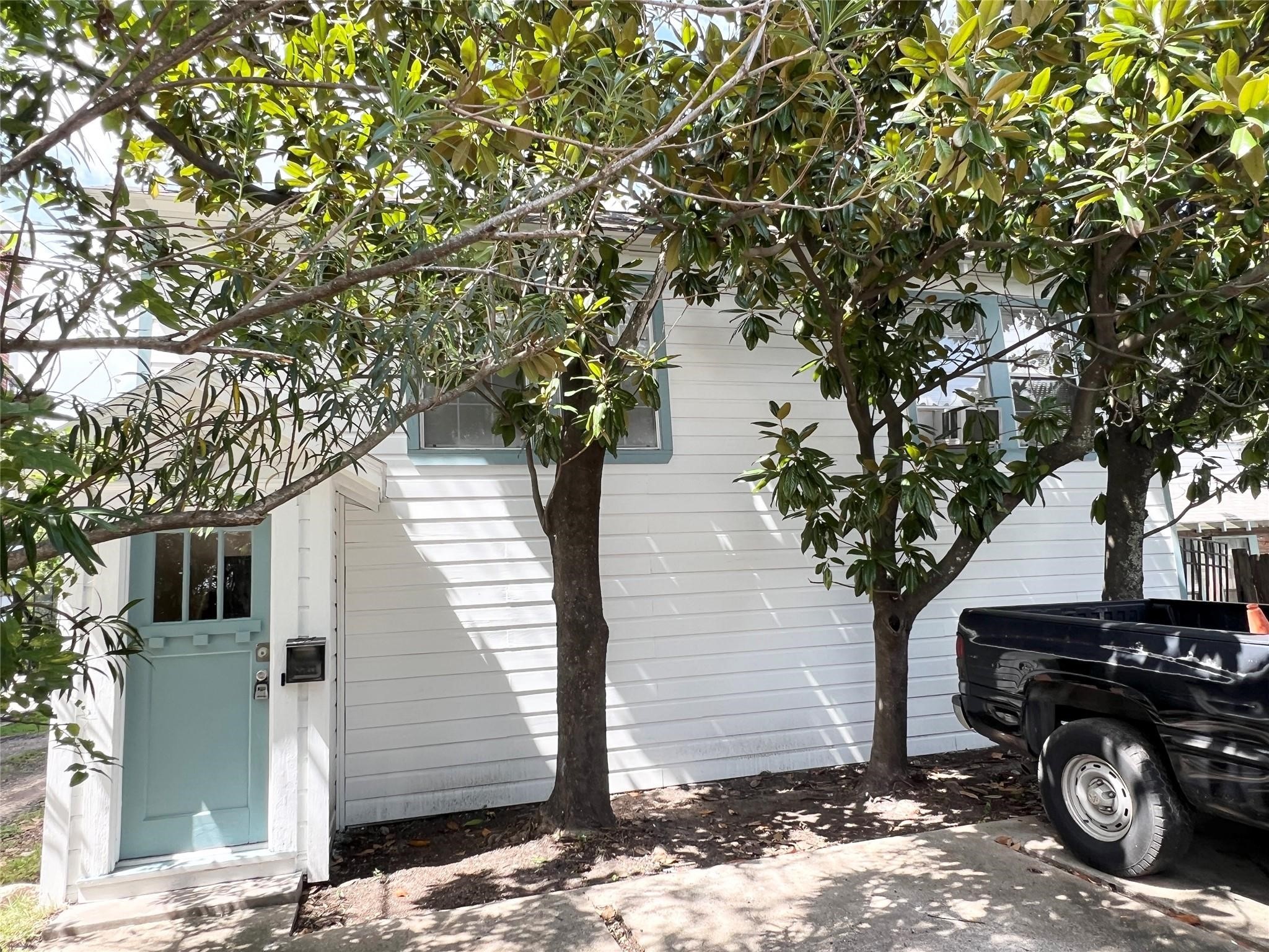 a car parked in front of a house