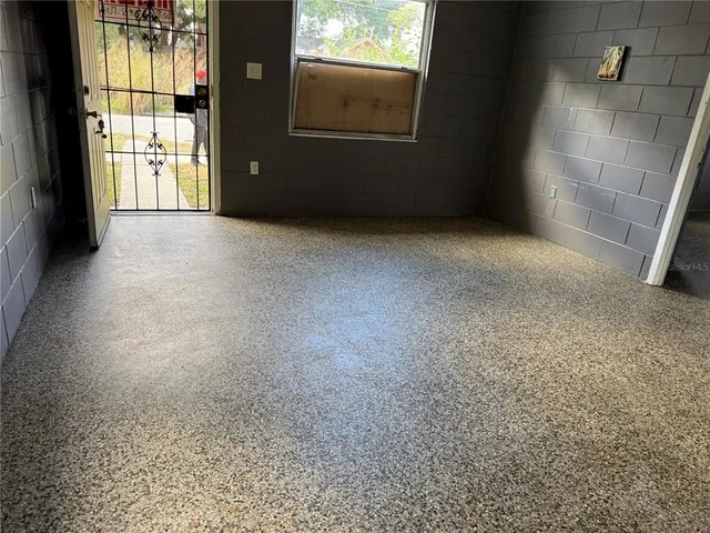 a view of a room with a hardwood