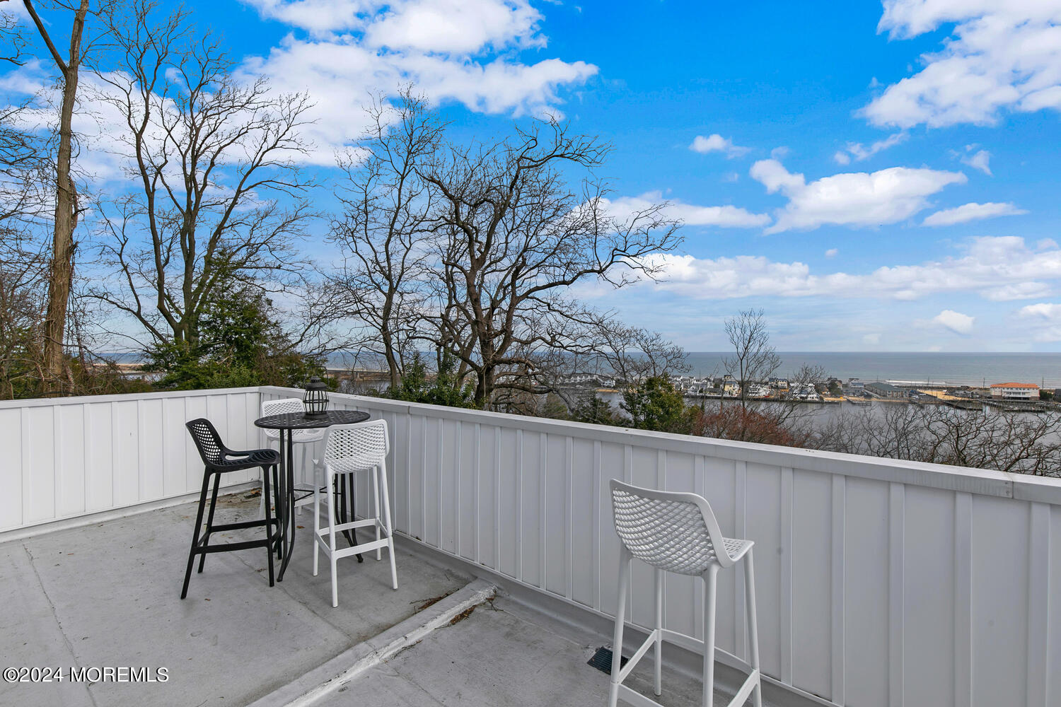 157 Portland Road Highlands, NJ 07732 - Photo 47 of 63 a view of a chairs and table in the balcony