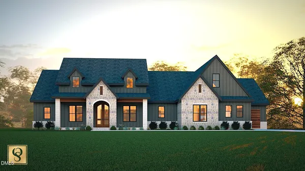 front view of a house with a yard