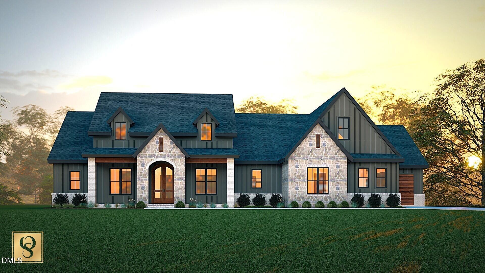 front view of a house with a yard