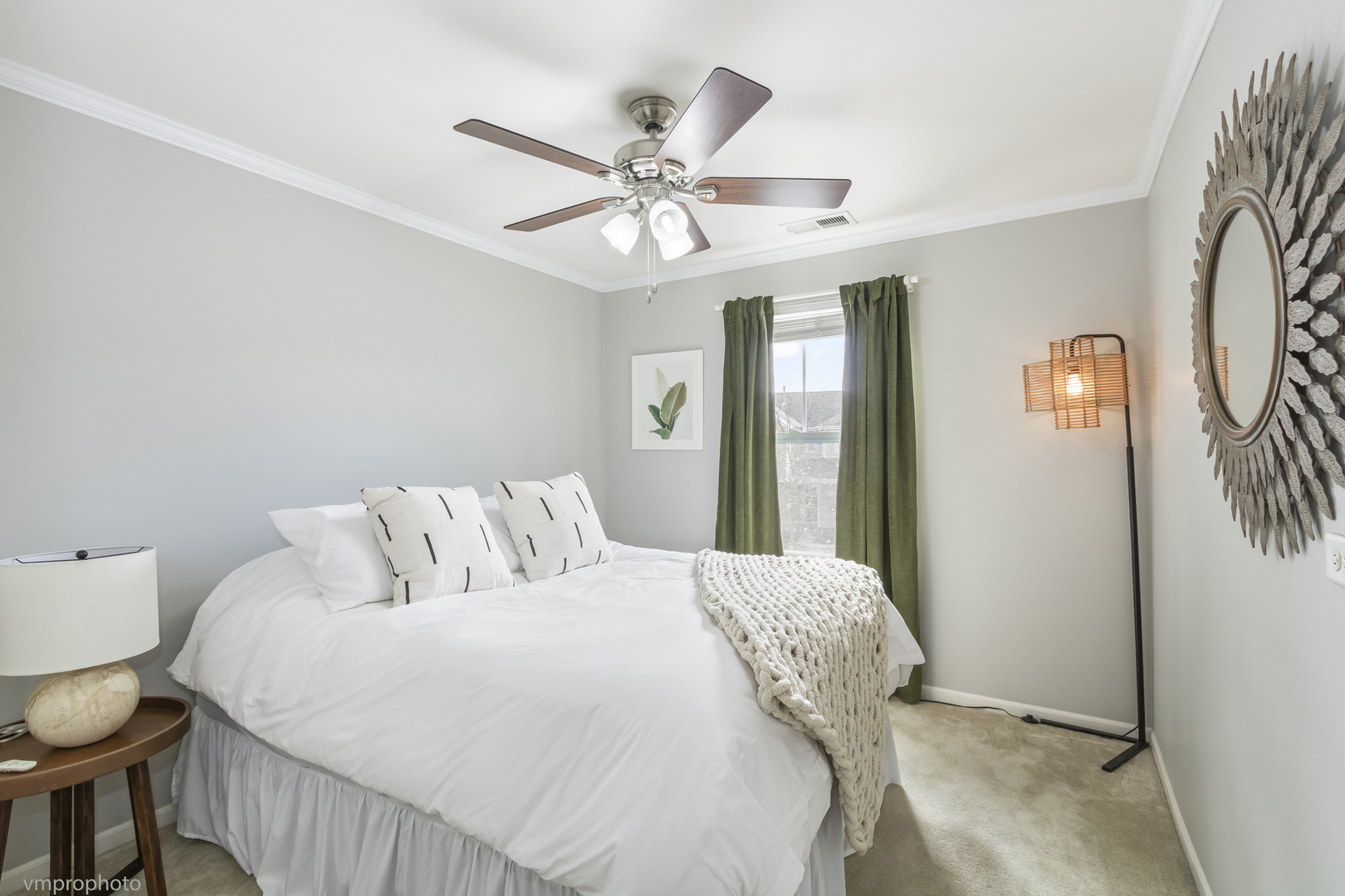 28 East Moseley Road Palatine, IL 60074 - Photo 12 of 25 a bedroom with a bed and a chandelier