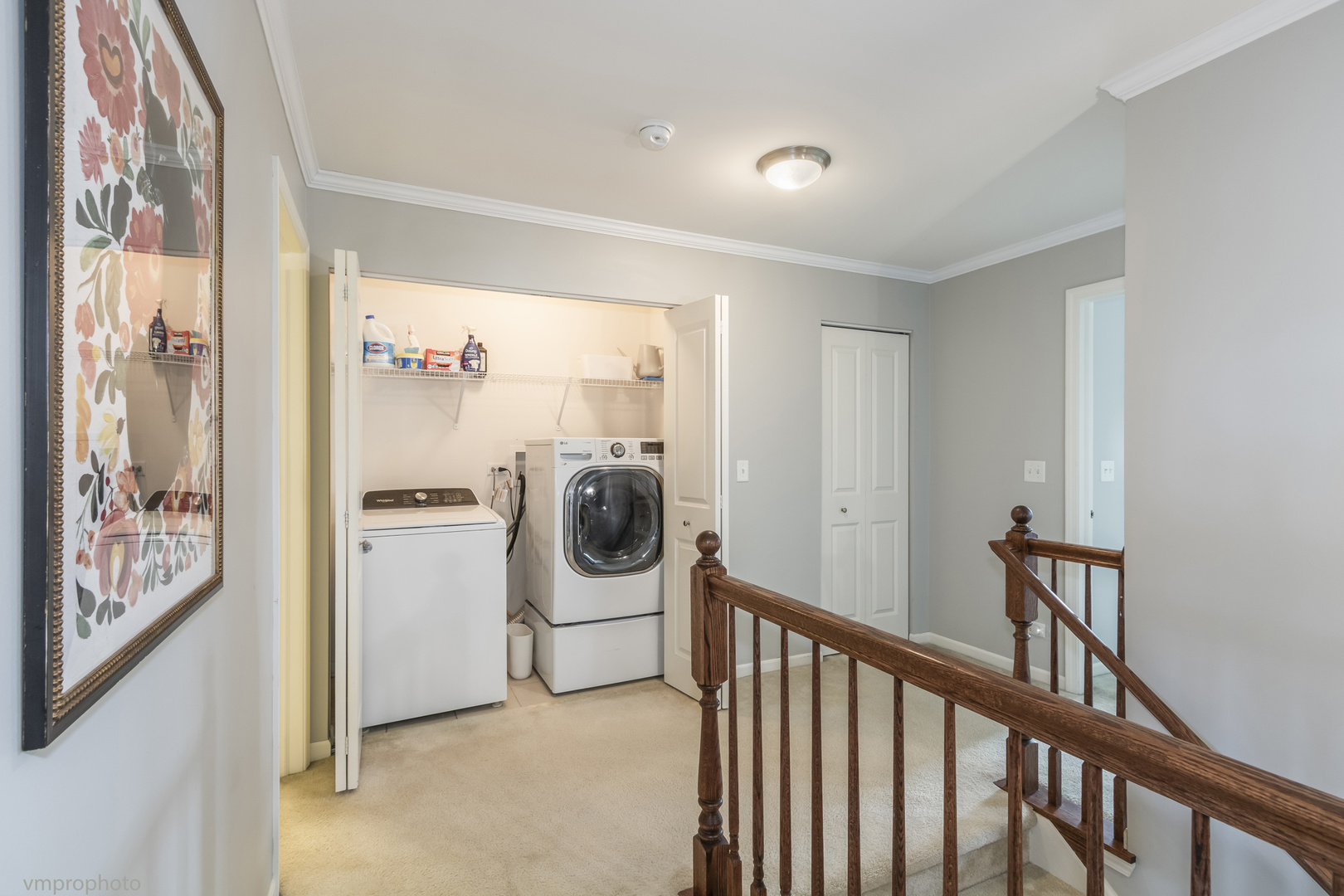 28 East Moseley Road Palatine, IL 60074 - Photo 15 of 25 a view of a hallway with washer and dryer