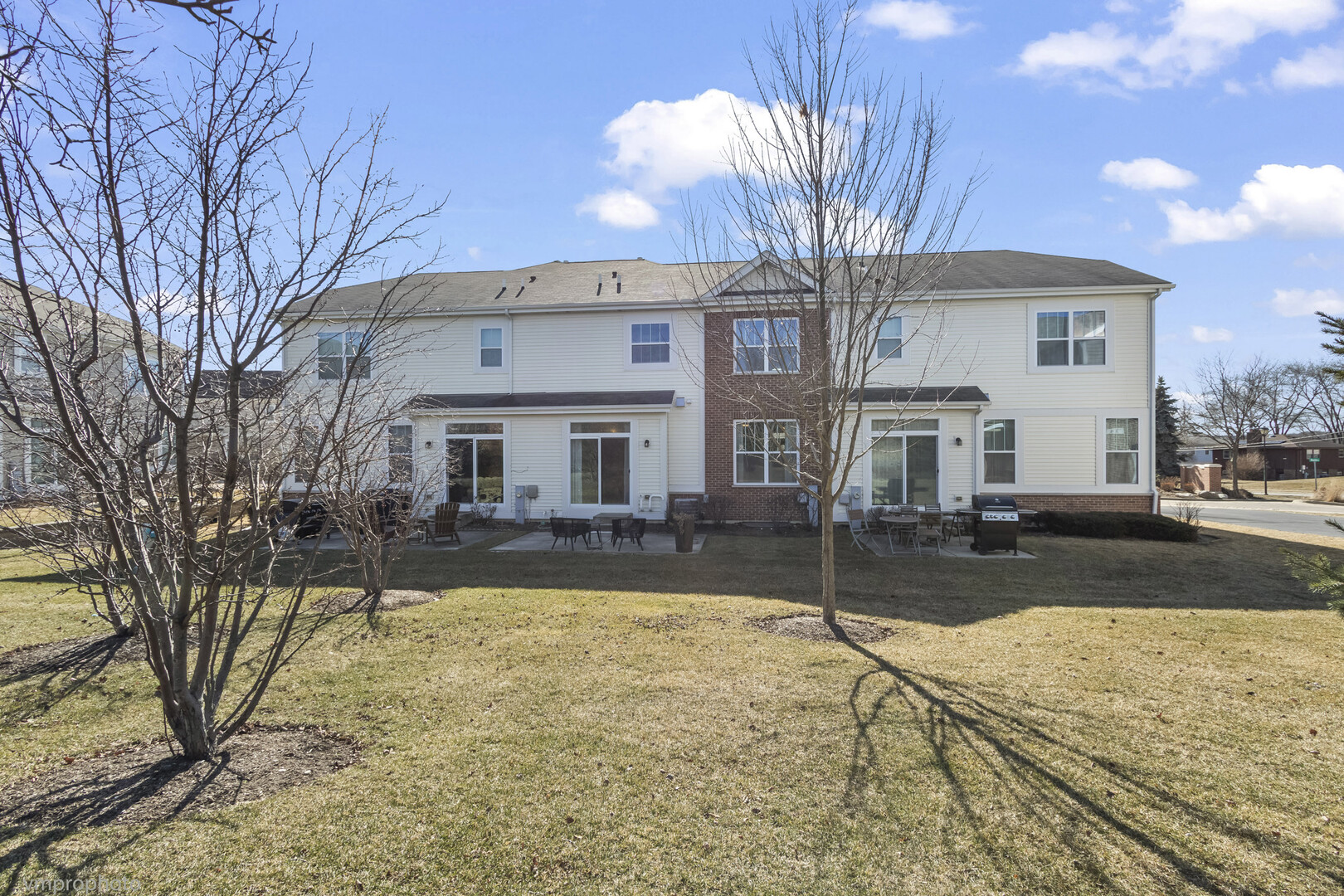 28 East Moseley Road Palatine, IL 60074 - Photo 22 of 25 a view of a house with a yard covered in snow