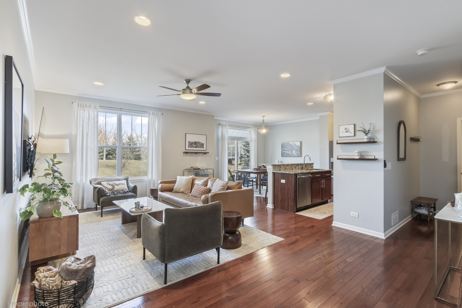 28 East Moseley Road Palatine, IL 60074 - Photo 3 of 25 a living room with furniture or kitchen and a wooden floor