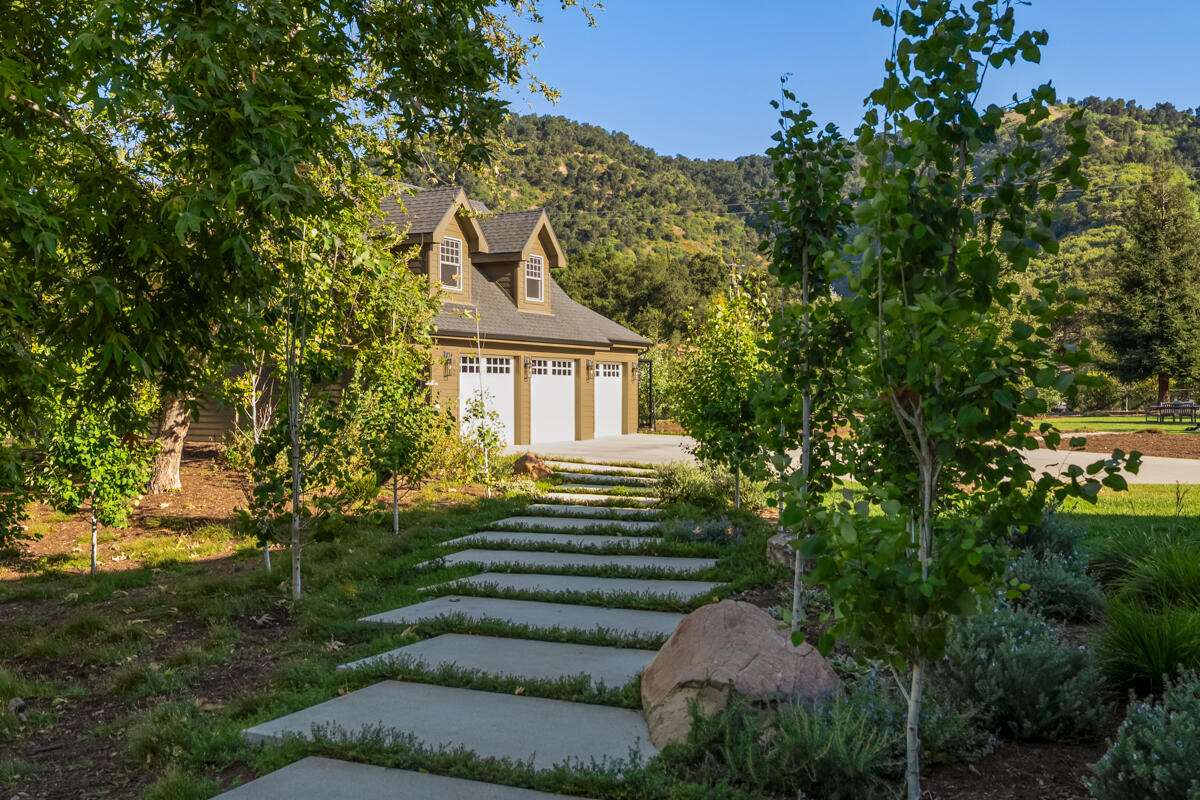 13100 Ojai Road Santa Paula, CA 93060 - Photo 48 of 60 a front view of a house with a garden