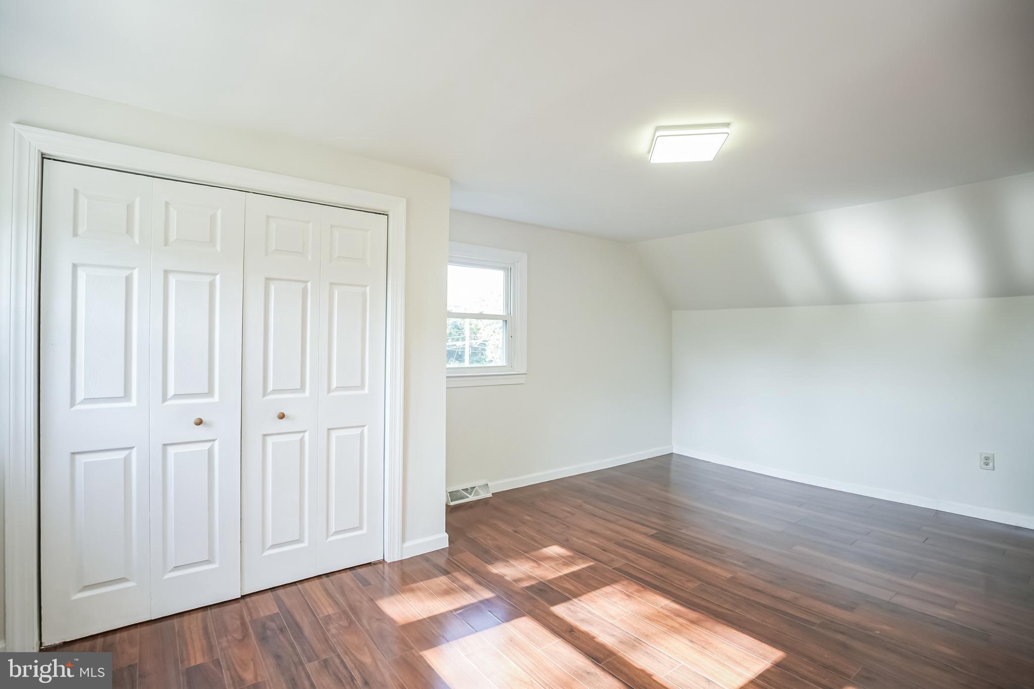 161 New Freedom Road Berlin, NJ 08009 - Photo 17 of 31 wooden floor in an empty room with a window